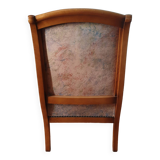 Fabric armchair with wooden frame