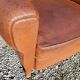 Fauteuil club en cuir brun art déco 1930