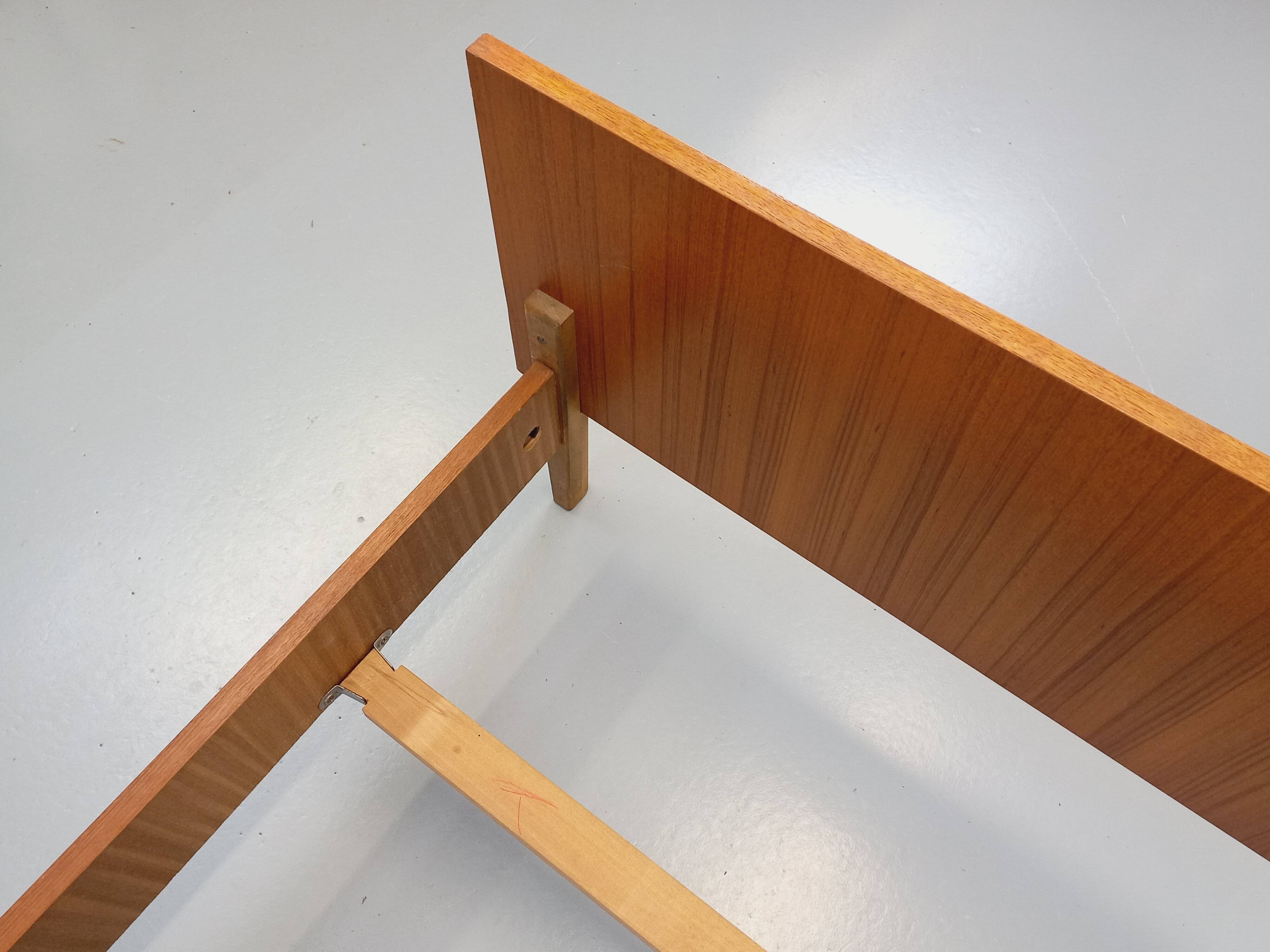 Vintage Scandinavian style double bed in teak from the 60s with integrated bedside lights