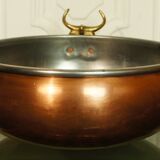Copper cauldron with golden bronze bull heads