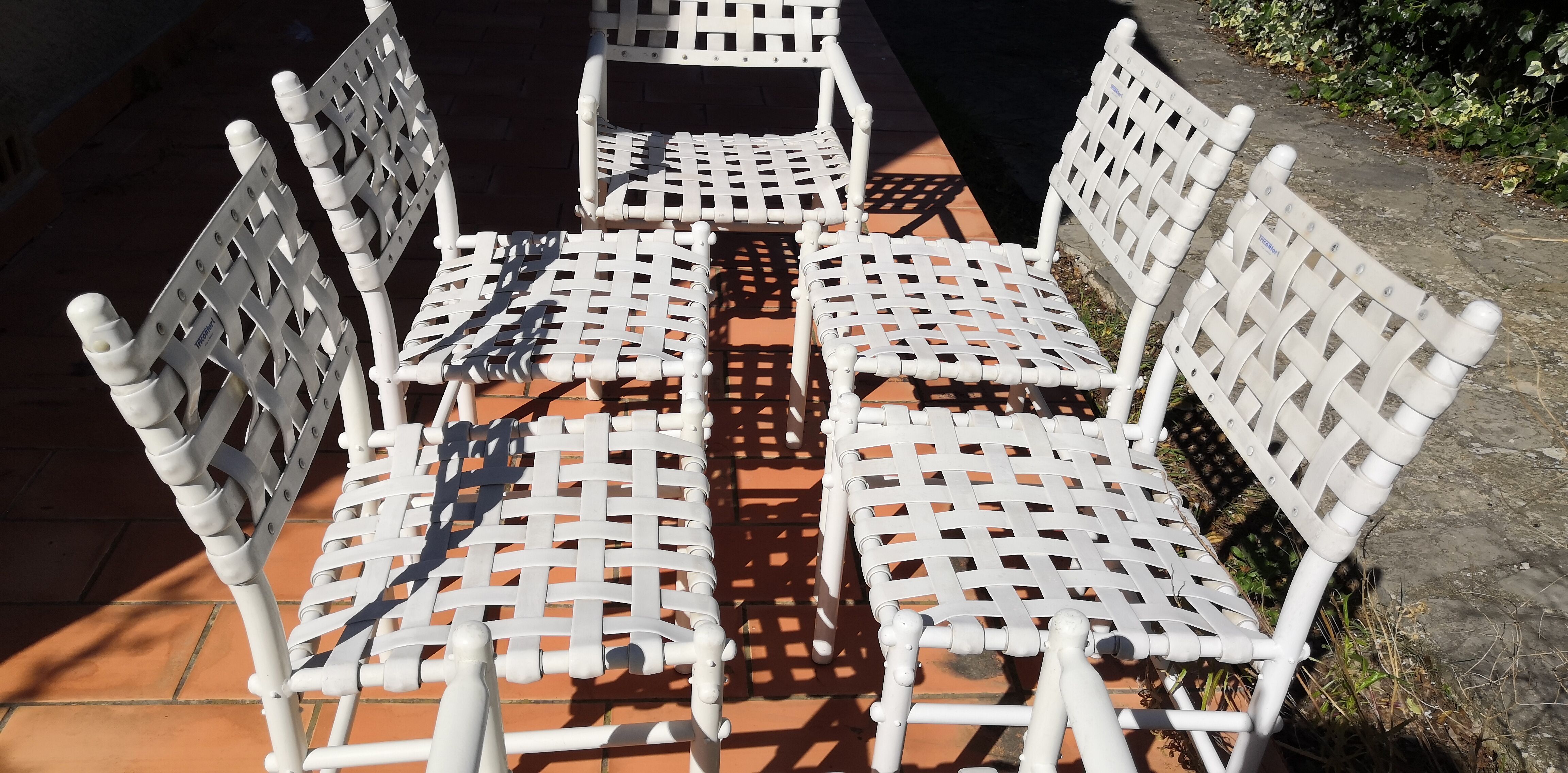 4 chairs & 2 vintage woven lounge armchairs triconfort, 1980 France