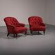 Pair of French red fabric button back armchairs