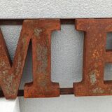 HOME rusty metal sign