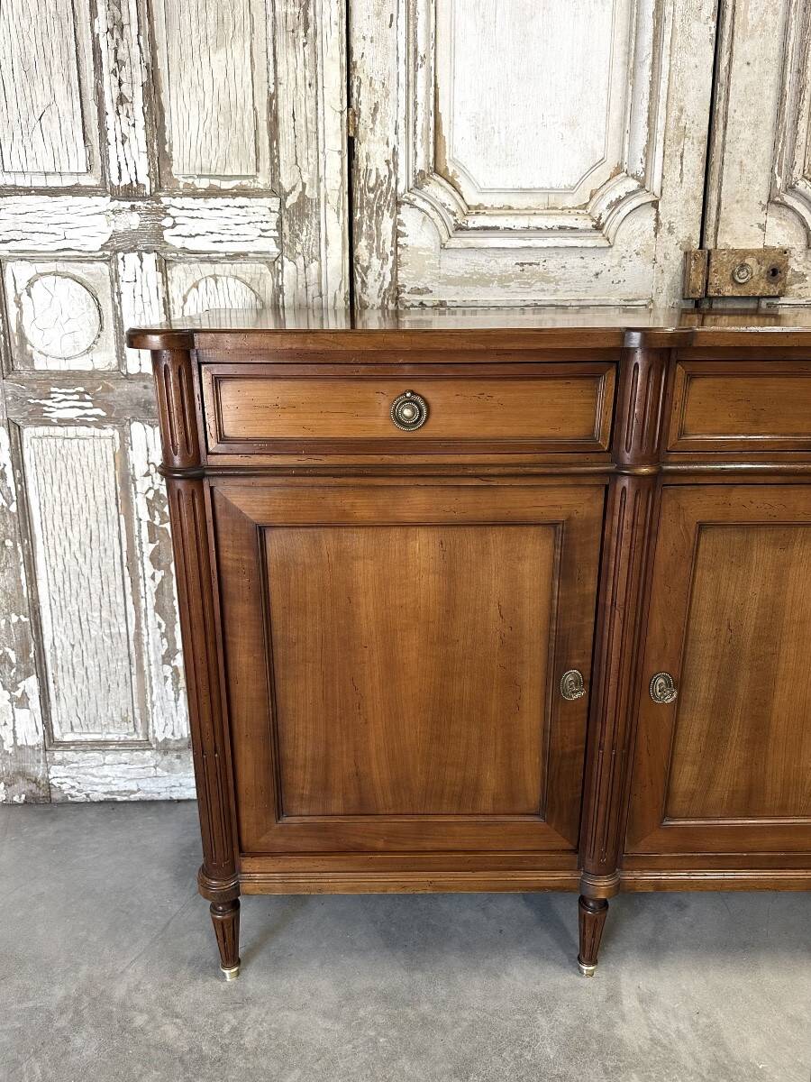 Louis XVI style enfilade in cherry wood, 20th century.