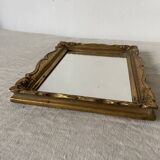 Small molded gilded mirror