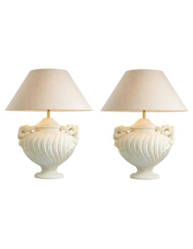 Pair of table lamps with antique look and brushed brass finish.
