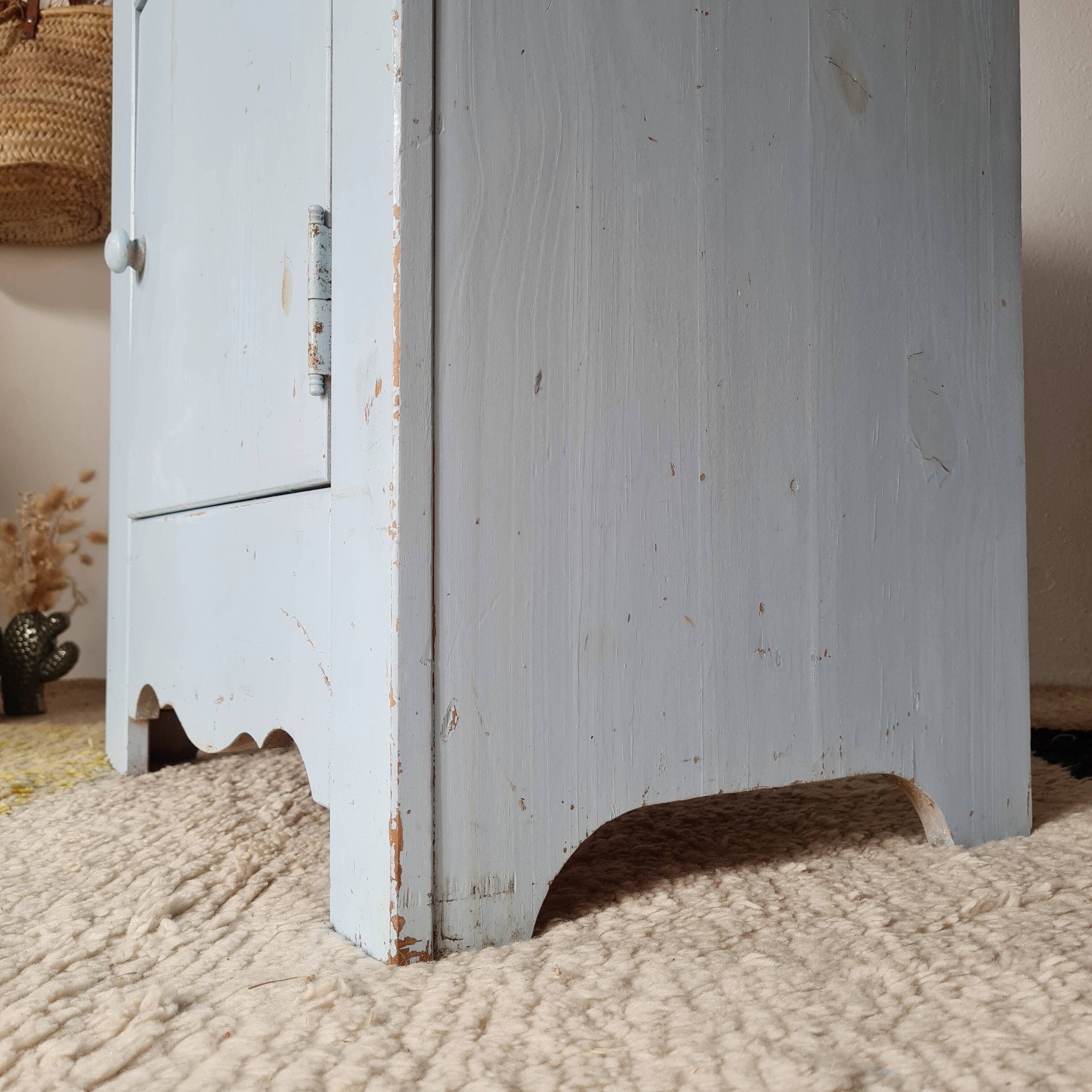 Handcrafted blue chest of drawers.