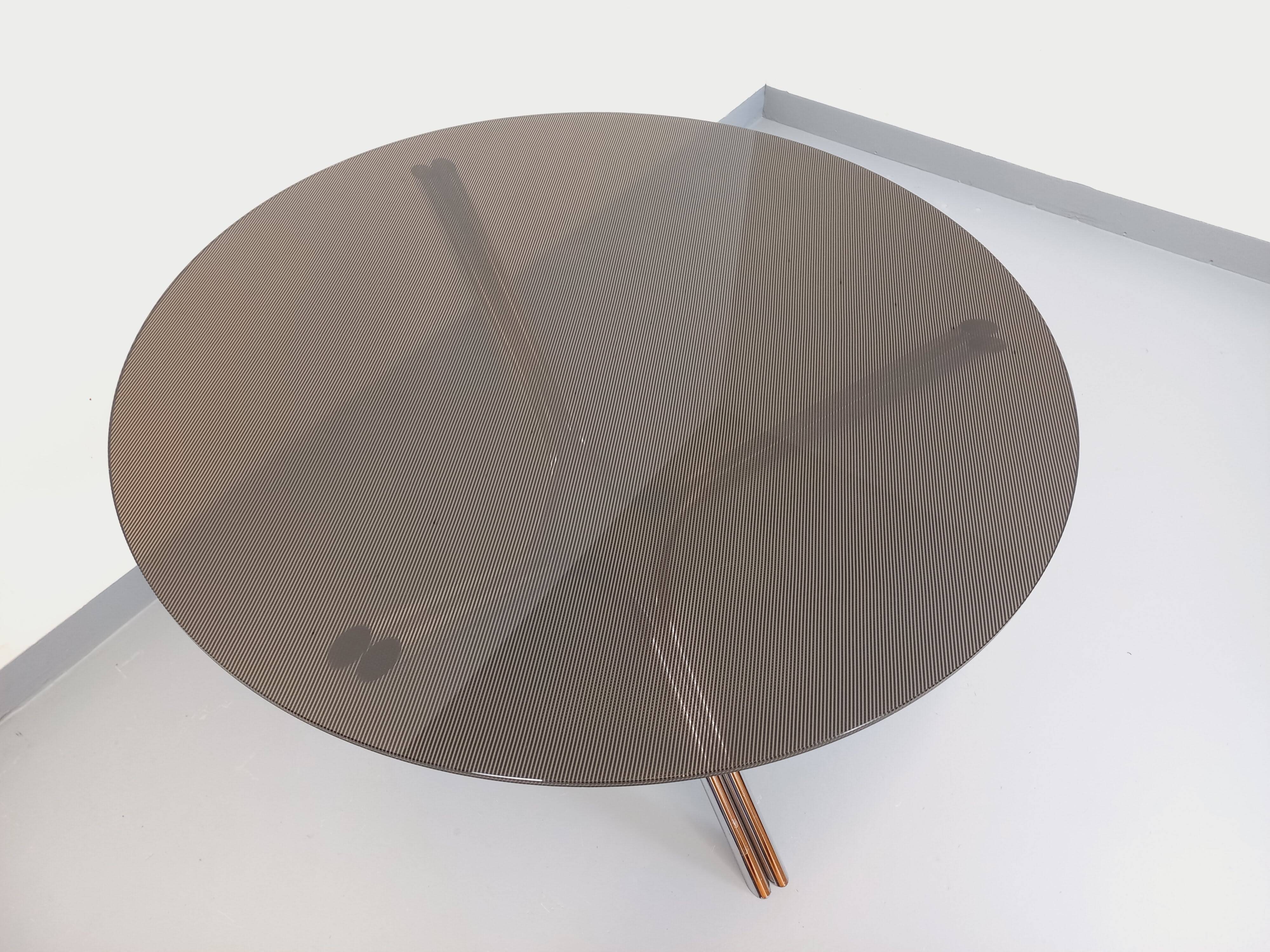Vintage dining table in smoked glass plexiglass and chrome metal.
