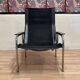 Reclining armchair in black leather and chrome design "hans eichenberger" 1960.