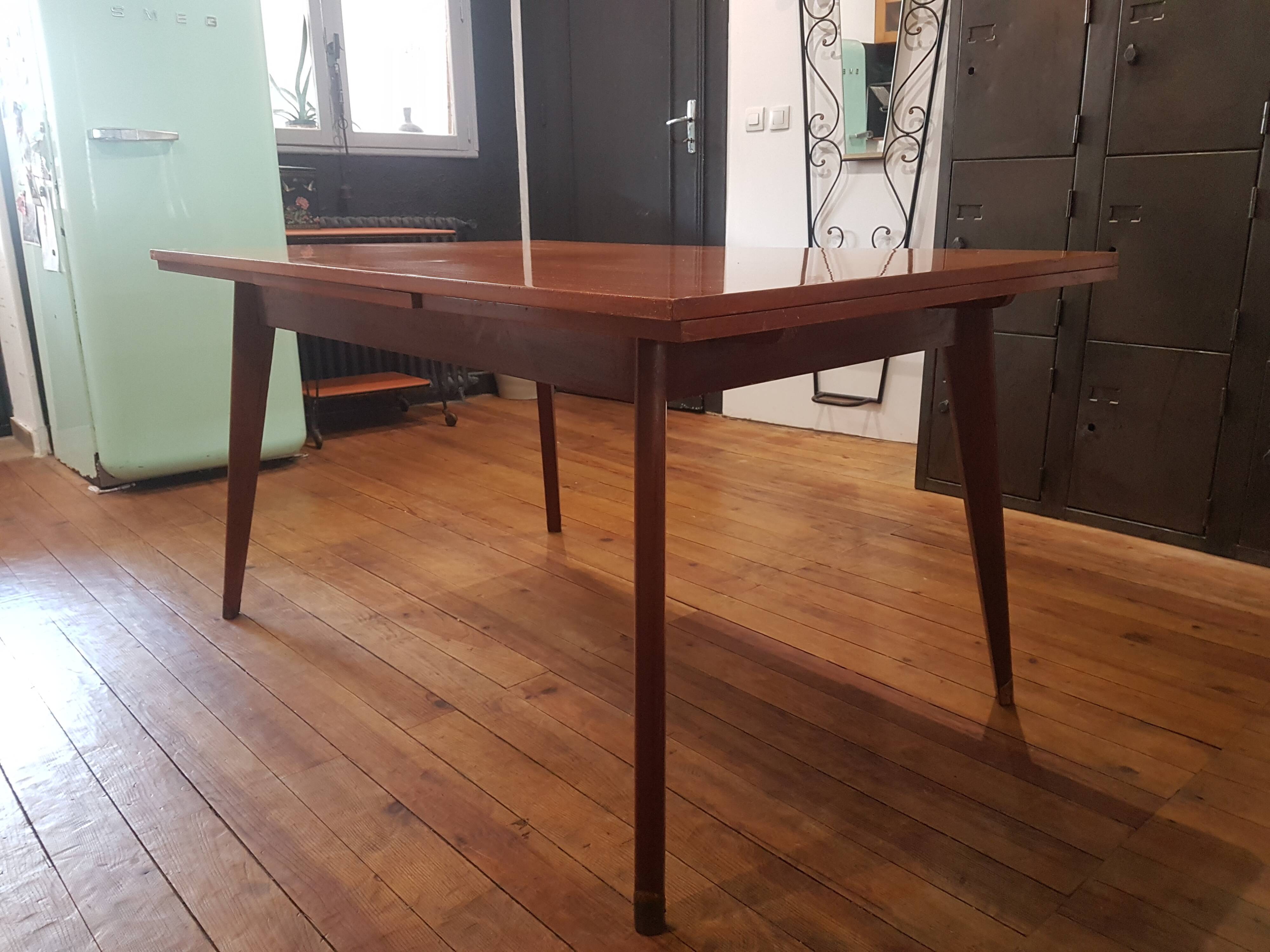 Table with extensions compass legs