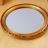 Round golden mirror