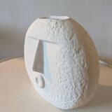 Stylized face biscuit vase