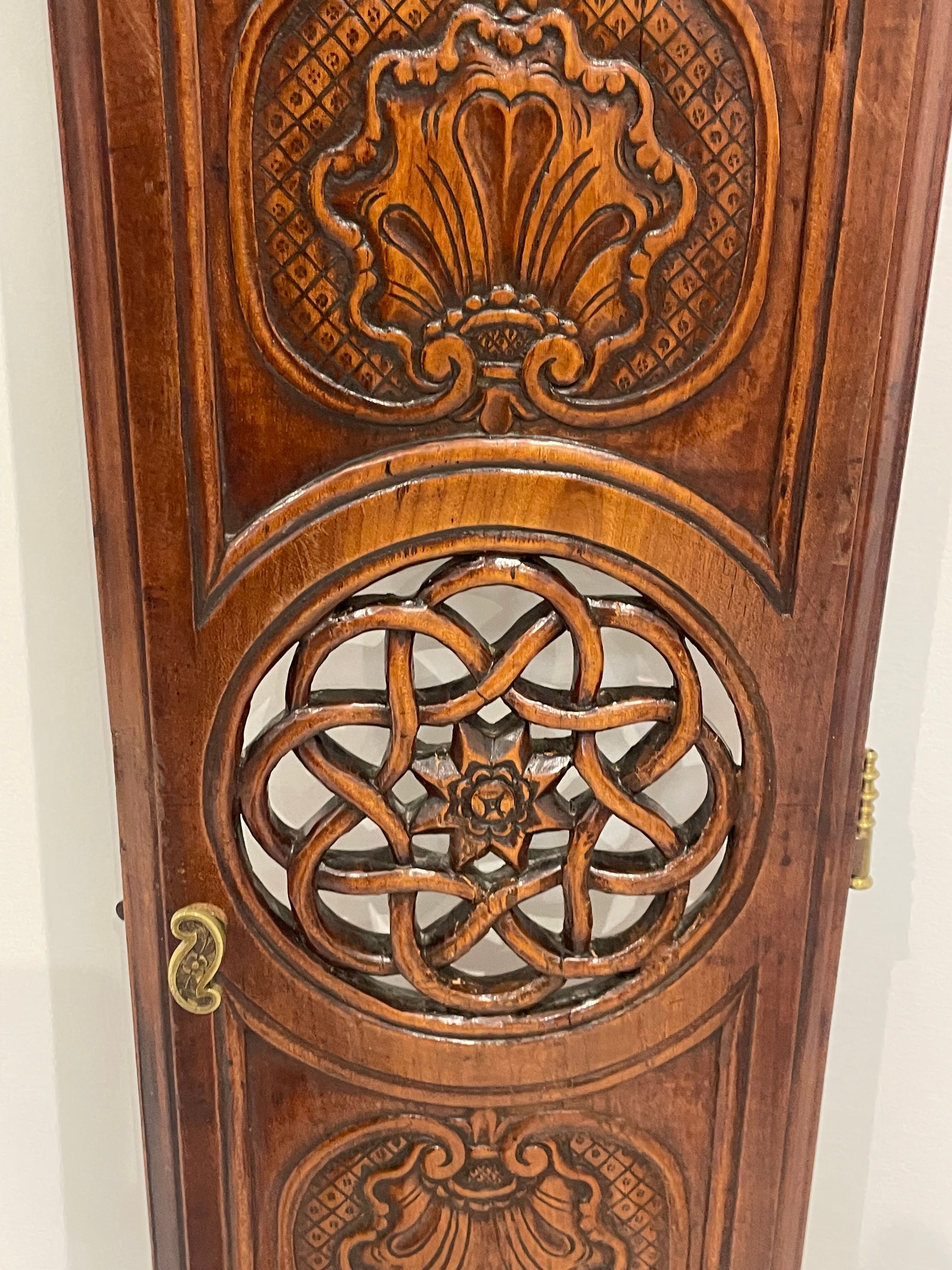 Clock door carved and openwork wood