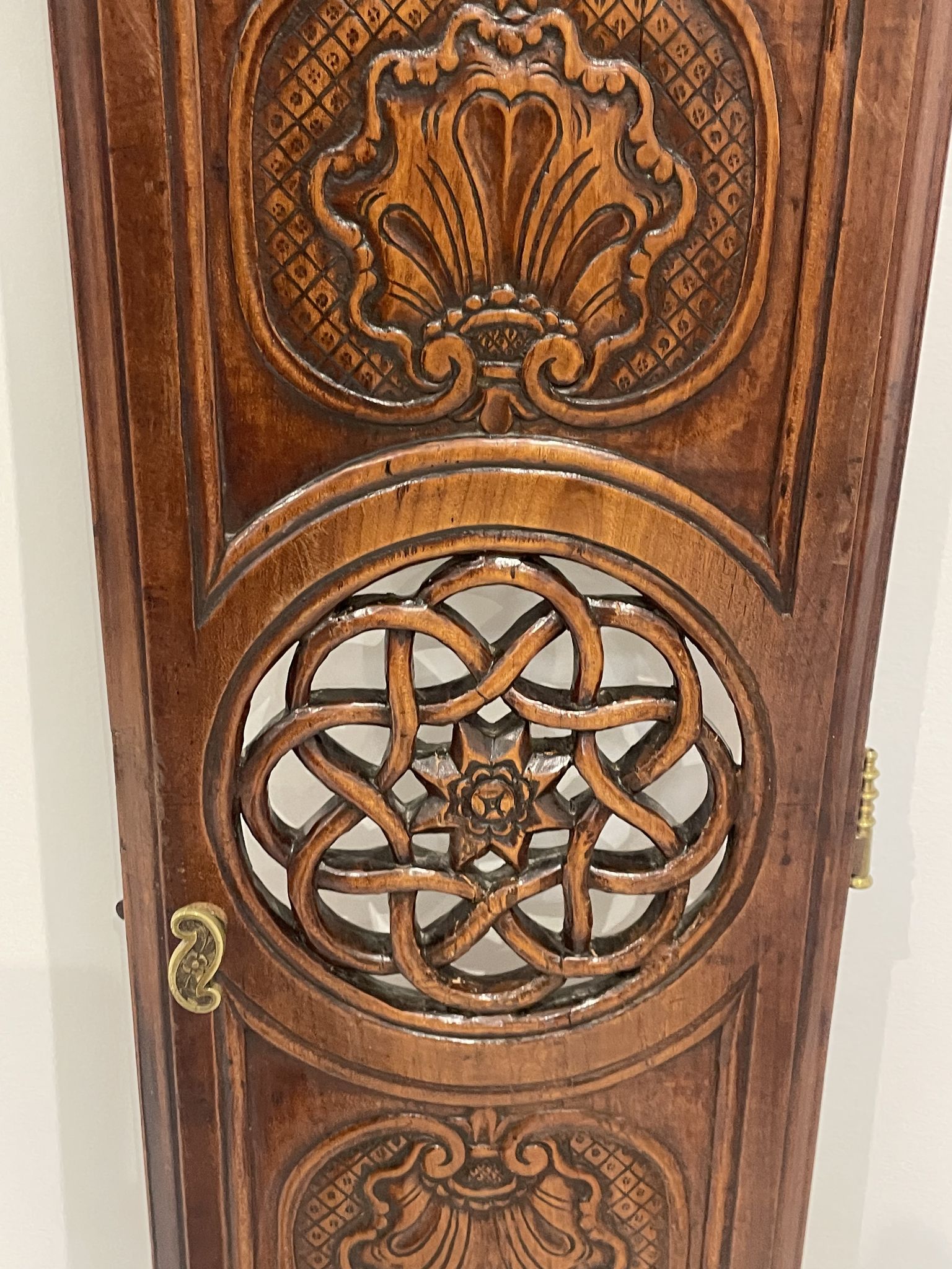 Clock door carved and openwork wood