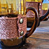 Orangeade set with pitcher and 6 amber glass glasses with "woven" fabric surround