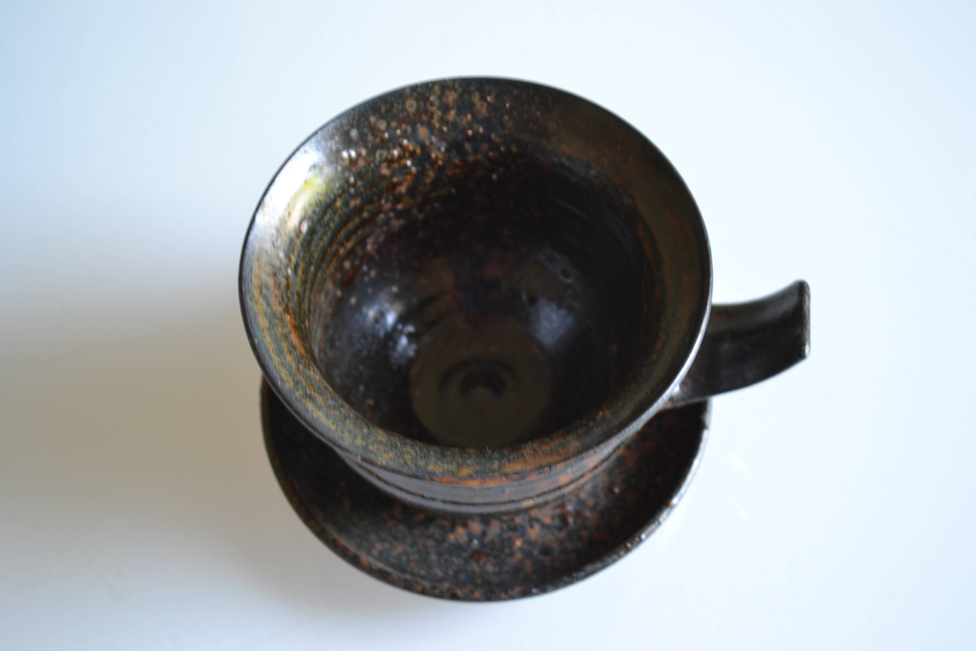 1970s ceramic cup and saucer signed