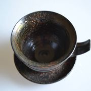 1970s ceramic cup and saucer signed