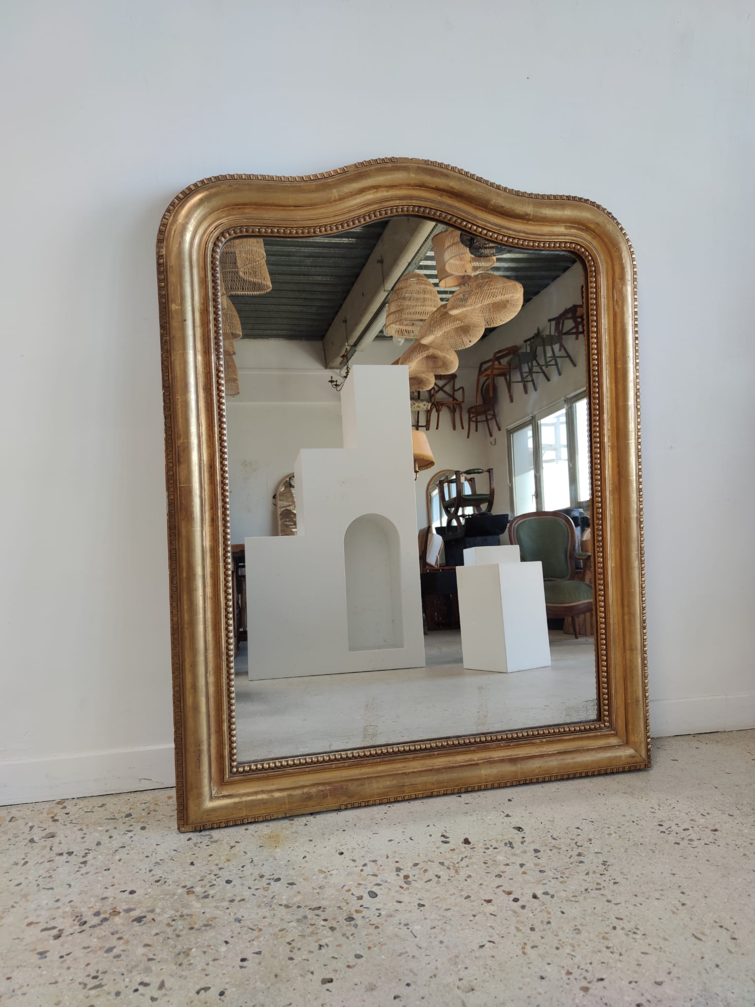 Louis Philippe gilded mirror with gendarme hat nineteenth H:130cm