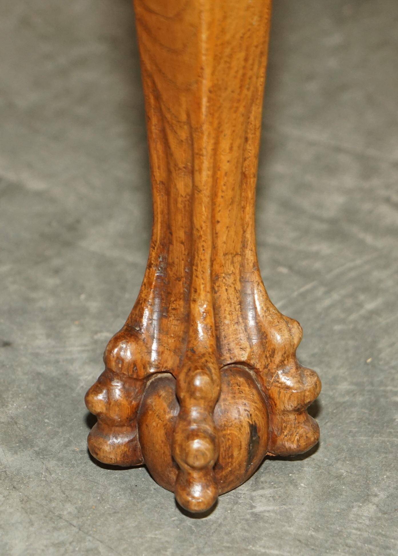Writing desk in pollard oak from around 1800 with claw and ball carved legs.
