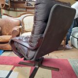Scandinavian tilting and rotating armchair