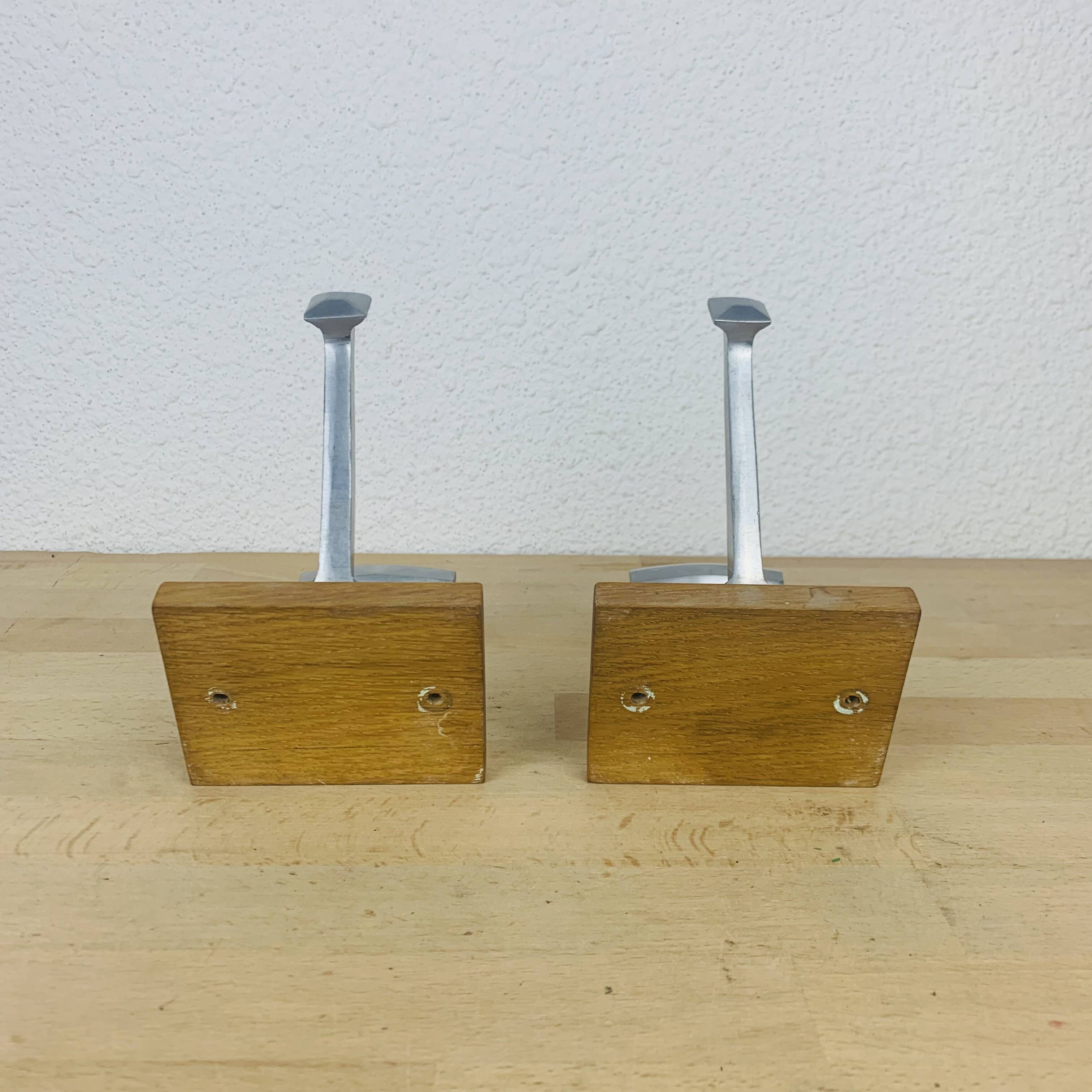 Pair of vintage aluminum coat hooks