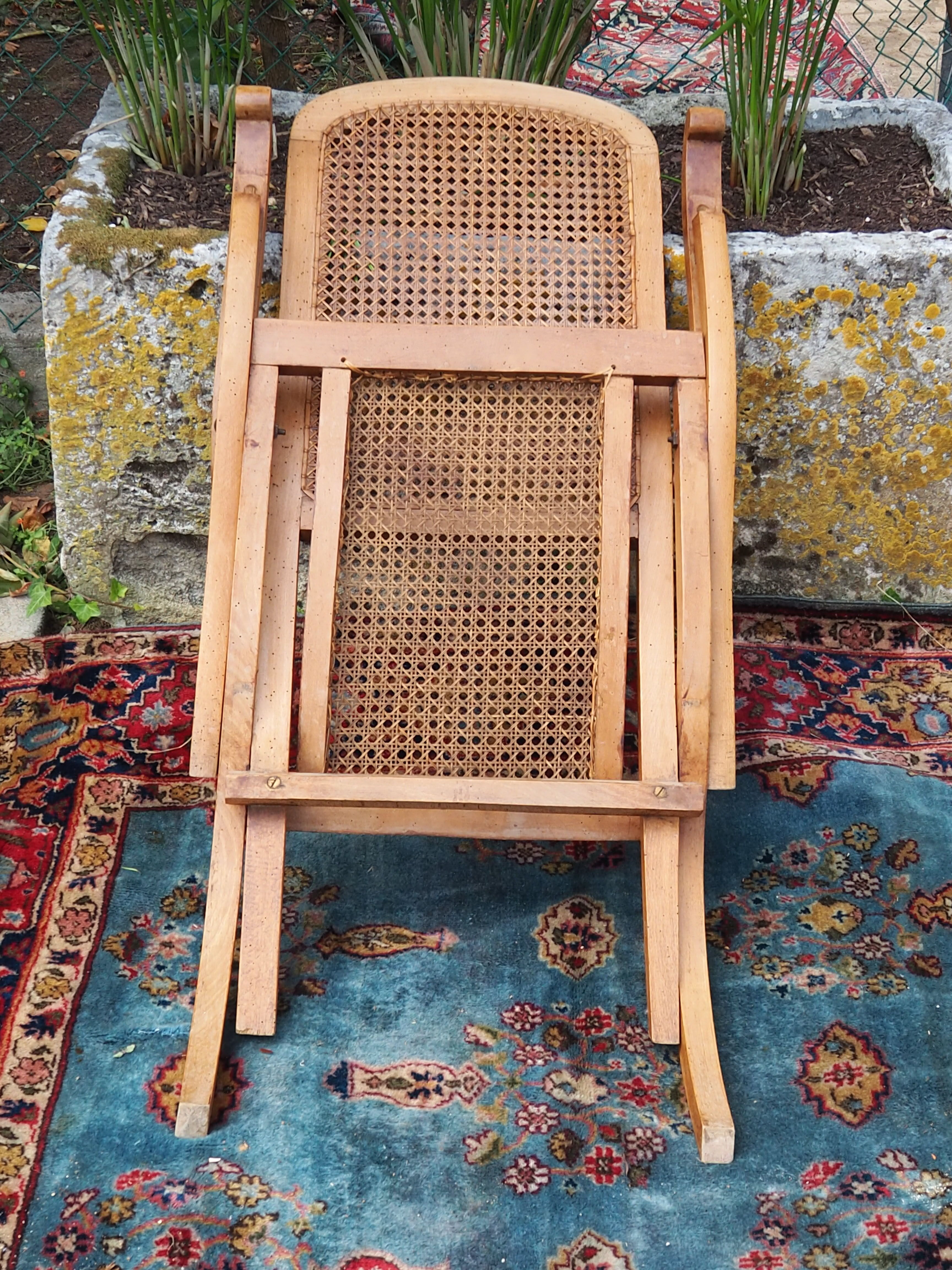 Cane folding armchair in solid wood