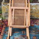 Fauteuil pliant canné en bois massif