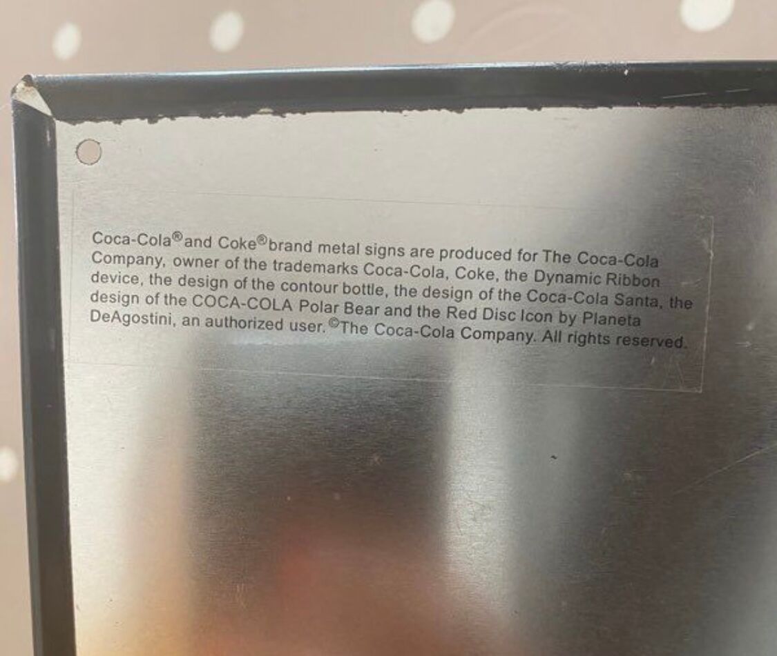 Coca-Cola metal plate