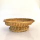Straw dish on pedestal