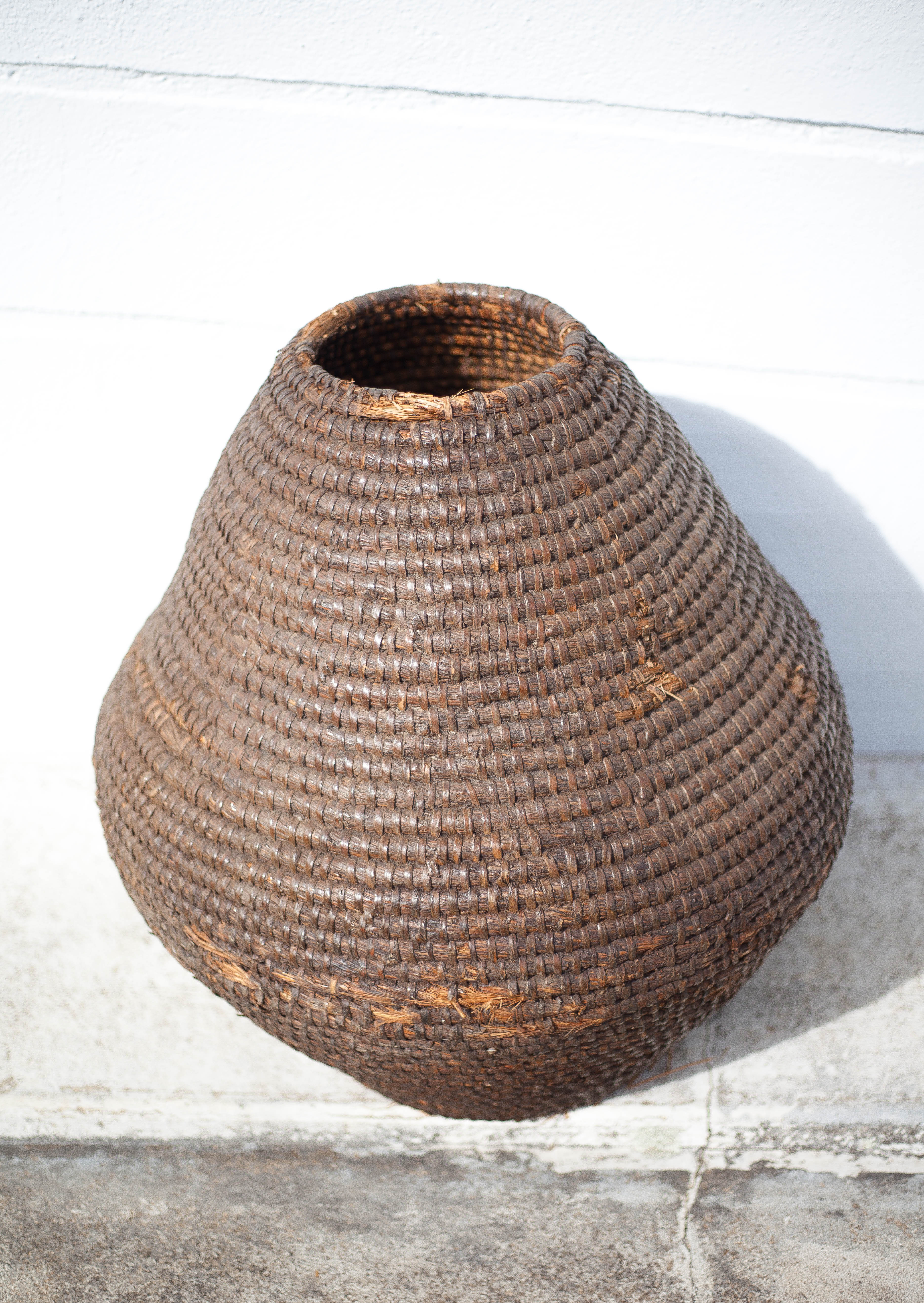 Old basket, straw and bramble bud
