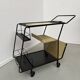 Perforated metal serving trolley in the Mathieu Matégot style