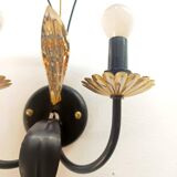 Black and gold Hollywood Regency leaf wall sconce