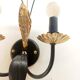 Black and gold Hollywood Regency leaf wall sconce