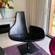 Fjord armchair by Moroso with its pouf, designed by Patricia Urquiola in 2002, made of steel and smooth black leather.