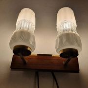 Vintage gold wall light on wooden stand