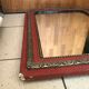Antique Louis Philippe mirror in wood and plaster with a row of pearls and vintage friezes