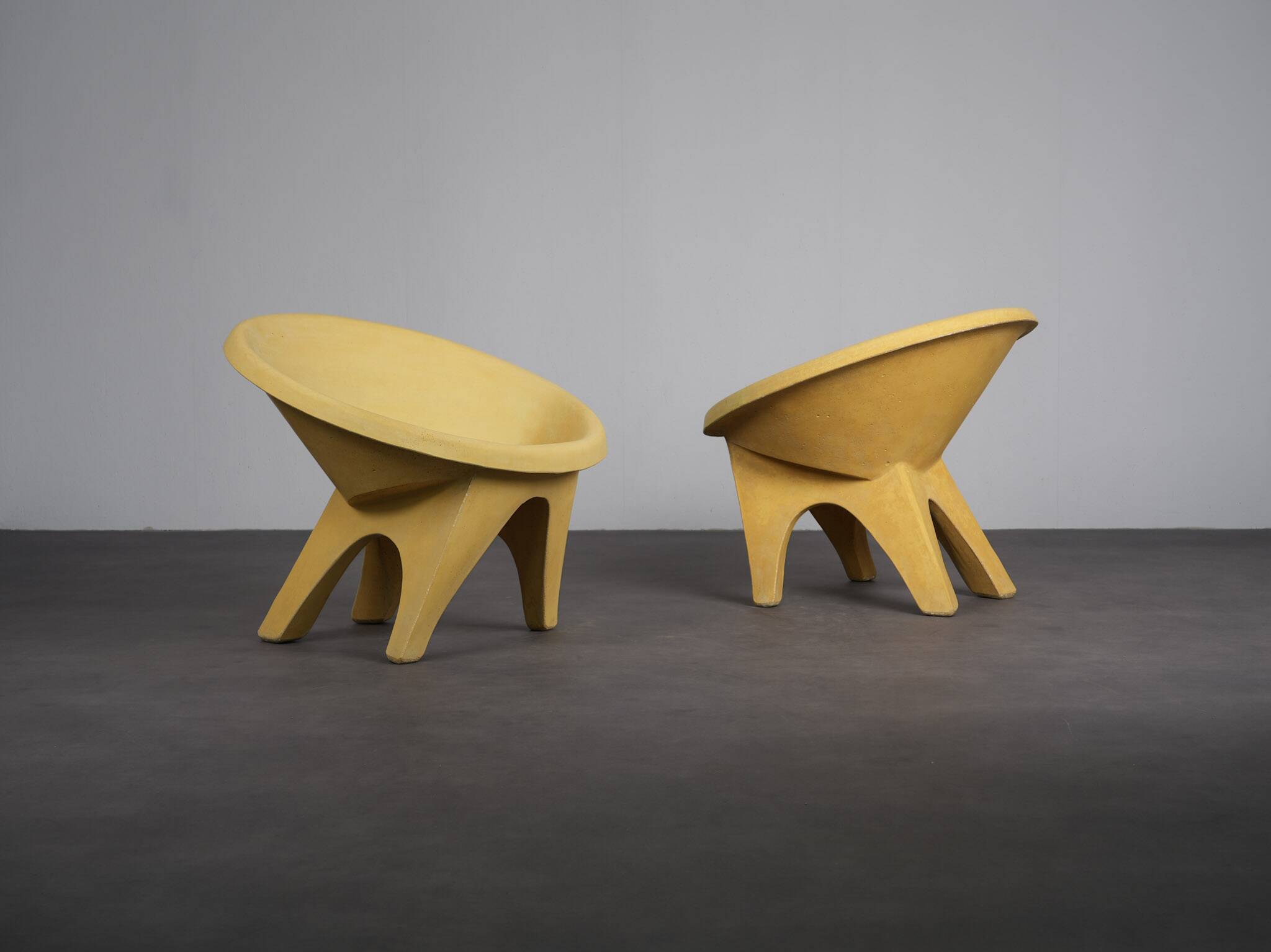 Rare pair of sculptural concrete lounge chairs, Italy, 1960s