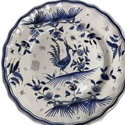 Moustiers, pairs of plates with wading bird design, scalloped edge, early 20th century.