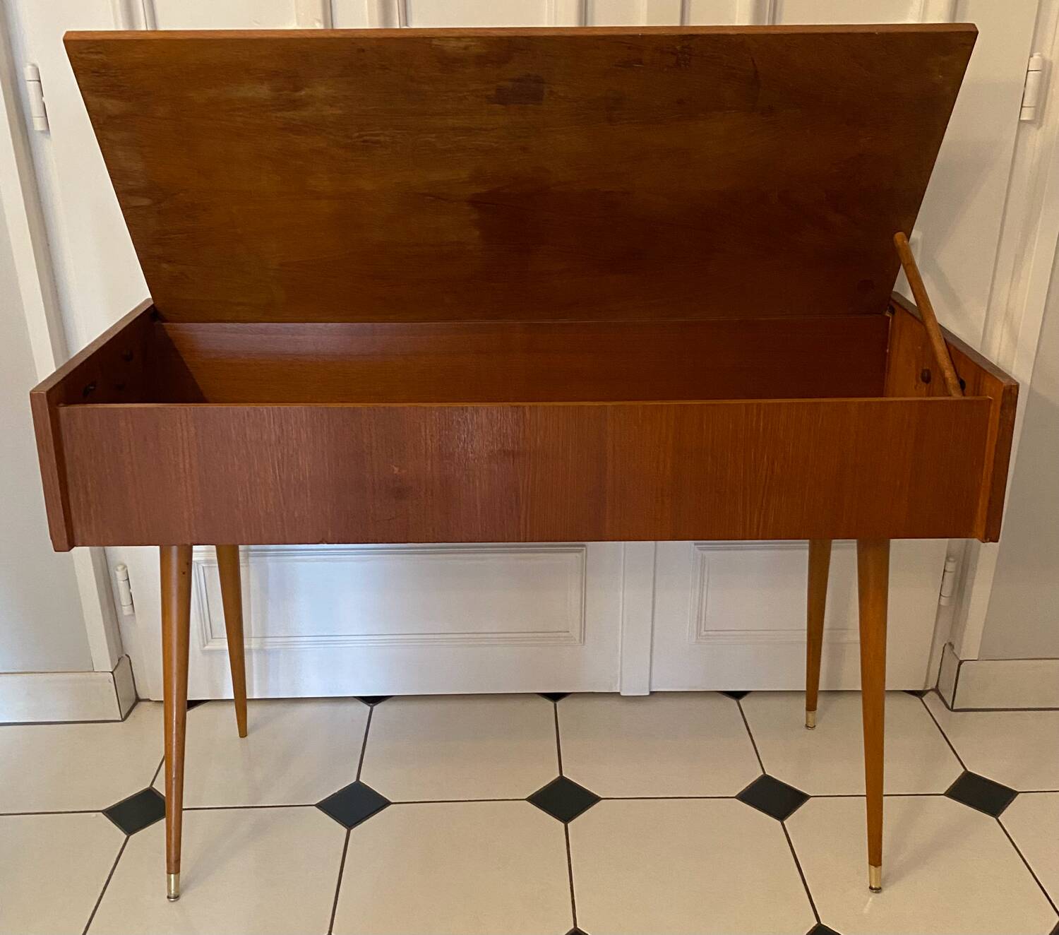 Vintage console with compass feet