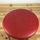 Tabouret Baumann rouge en bois