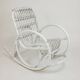 Vintage rocking chair for children in rattan/bamboo.