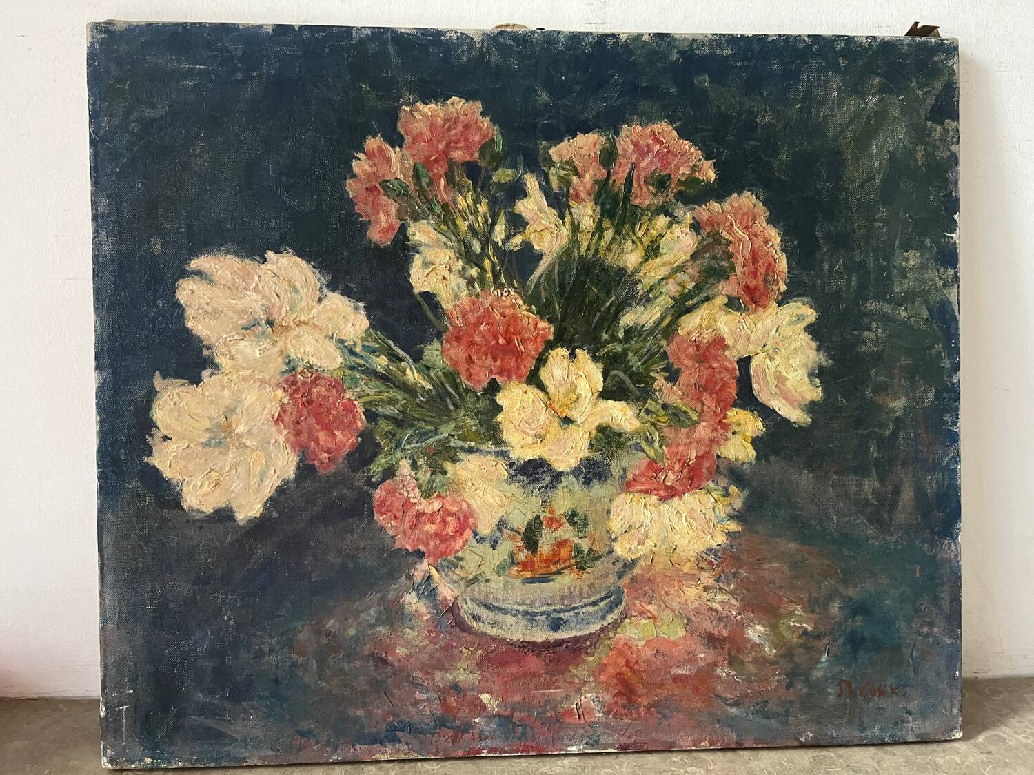 Bouquet of carnations in a blue and white vase, signed