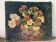 Bouquet of carnations in a blue and white vase, signed