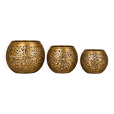 Set of 3 handmade brass candle holders with an openwork pattern.