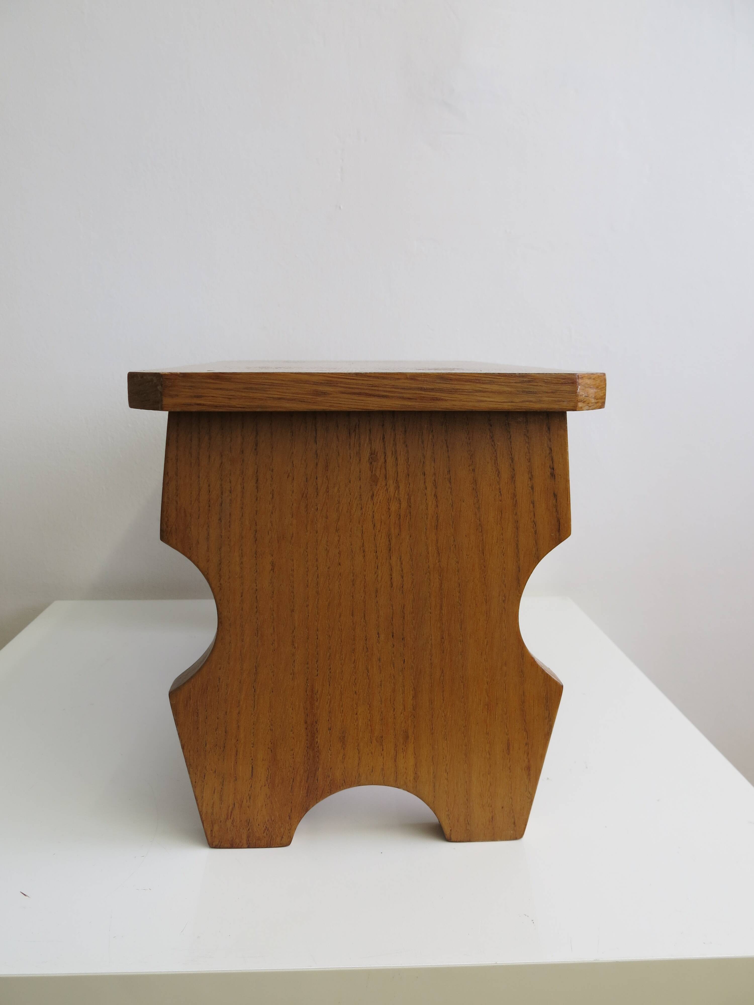 Small wooden footrest stool