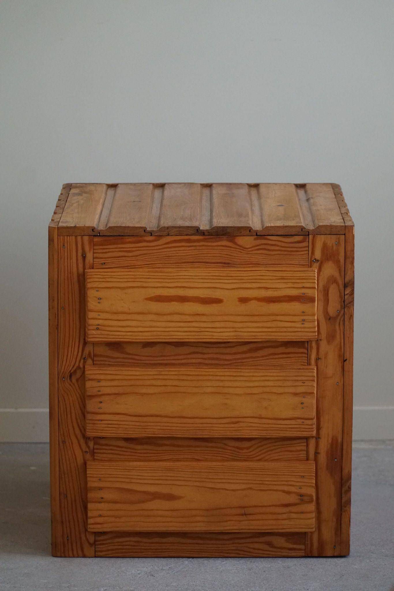 Free-standing primitive pine commode, mid-century Swedish, 1950s.