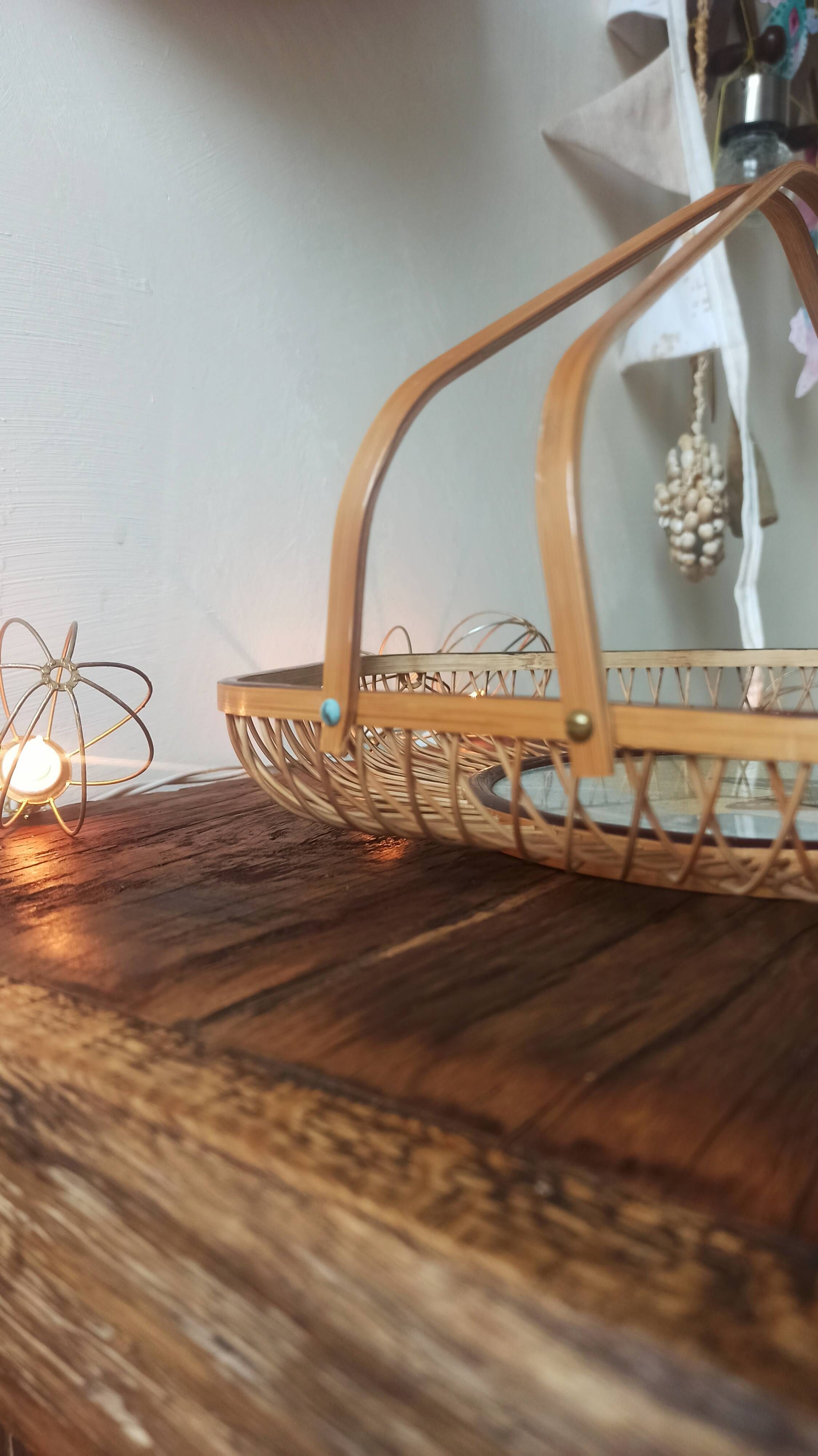 Rattan basket/tray/coin tray with a collection butterfly.