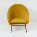 Fauteuil coque jaune vintage