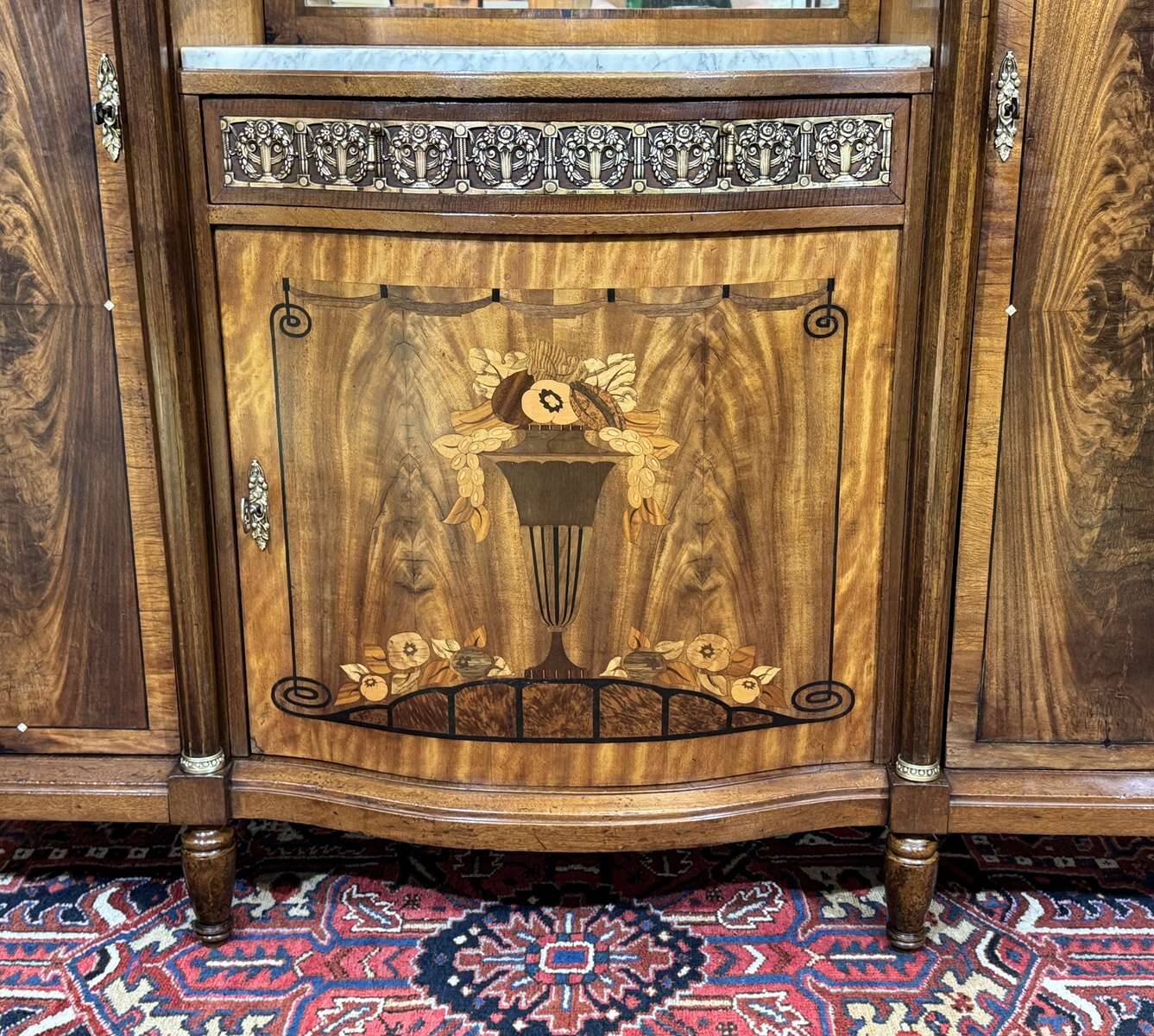 Art Deco buffet in mahogany, oak, and marble top.