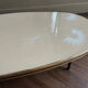 Tripod coffee table with floral design from the 1950s in brass metal and decorative top.